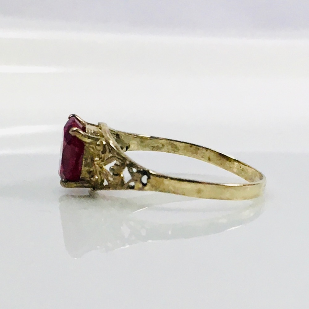 Ruby Solitaire Open Scroll Ring In 10k Gold - image 5